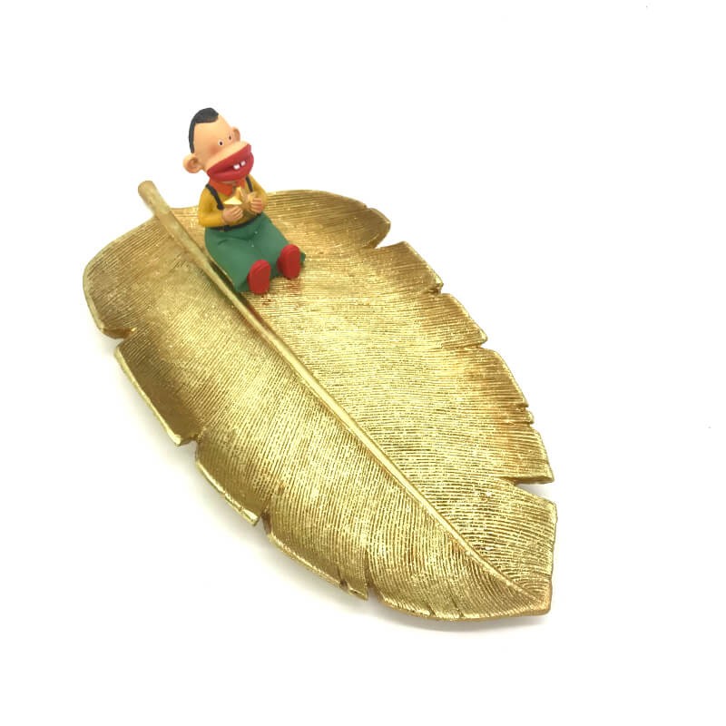 PLATEAU AVEC PIECE DECORATIVE EN RESINE